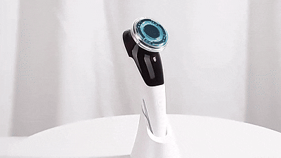 Masajeador facial con frío y calor antiarrugas rosa